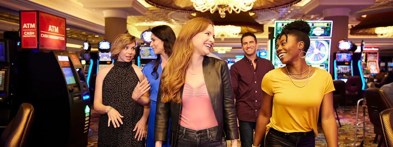 a group walks on casino gaming floor